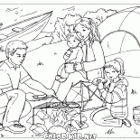 Famille au feu de camp
